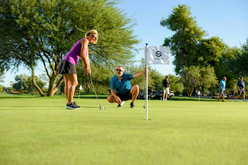 golfers on golf course